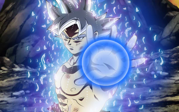 HD desktop wallpaper featuring Goku in his Ultra Instinct form from Dragon Ball Super, surrounded by a glowing aura and holding a blue energy sphere.