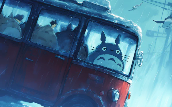 A charming HD wallpaper featuring Totoro from My Neighbor Totoro peering out from a red bus window on a snowy day, surrounded by fellow creatures.