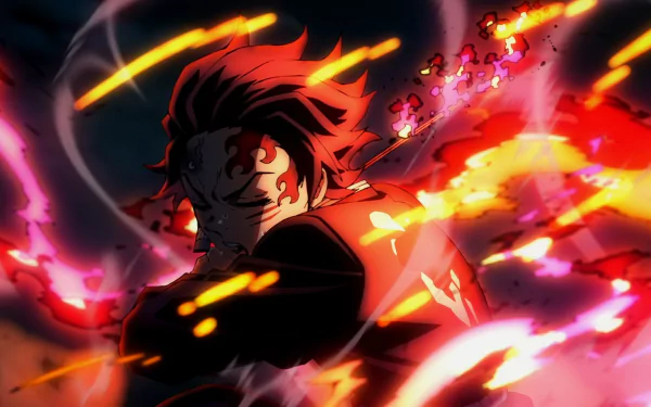 HD desktop wallpaper featuring intense battle scene from Anime Demon Slayer: Kimetsu no Yaiba, with a character surrounded by vibrant, fiery energy.