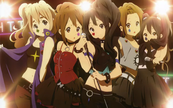 HD desktop wallpaper featuring anime characters Azusa Nakano, Tsumugi Kotobuki, Ritsu Tainaka, Yui Hirasawa, and Mio Akiyama from the series K-ON!, all dressed in gothic-style outfits under stage lights.