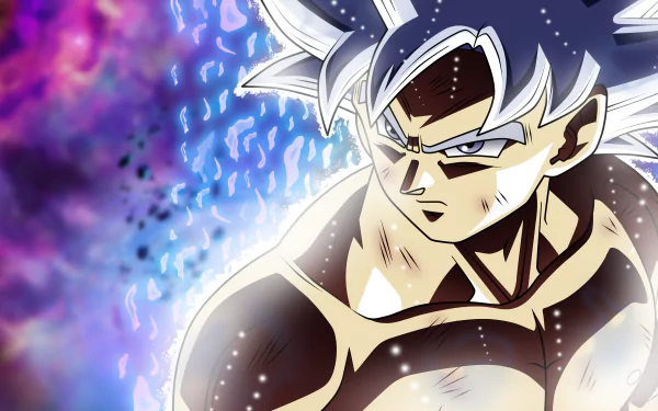HD desktop wallpaper featuring Goku in his Ultra Instinct form from Dragon Ball Super. The image showcases Goku with silver hair, a determined expression, and an ethereal glow, set against a vibrant, cosmic background.