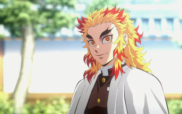 HD Anime desktop wallpaper featuring a vibrant portrait of Kyojuro Rengoku from Demon Slayer: Kimetsu no Yaiba, set against a blurred outdoor background.