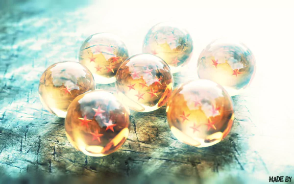 HD desktop wallpaper featuring the Dragon Balls from Dragon Ball Z, artistically rendered with a glowing, mystical effect on a textured surface.