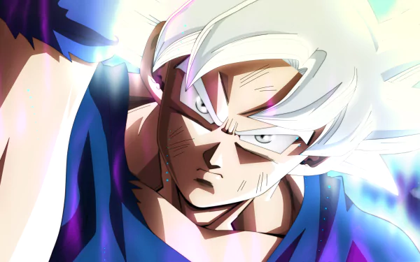 HD desktop wallpaper featuring Goku from Dragon Ball Super in Ultra Instinct form, showcasing his intense focus and energy.