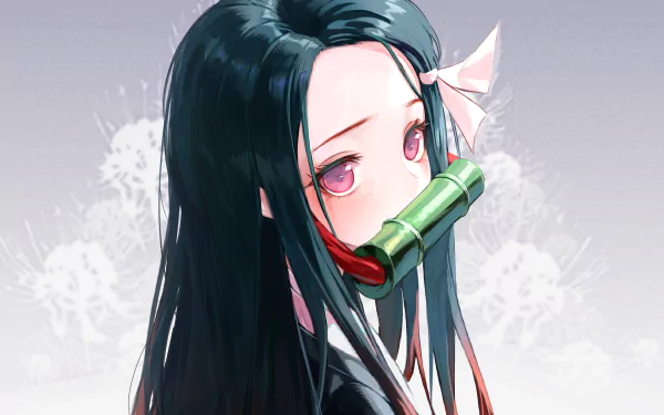 An HD wallpaper featuring Nezuko Kamado from the anime Demon Slayer: Kimetsu no Yaiba, showcasing her iconic look with vibrant pink eyes and a bamboo muzzle against a soft background.