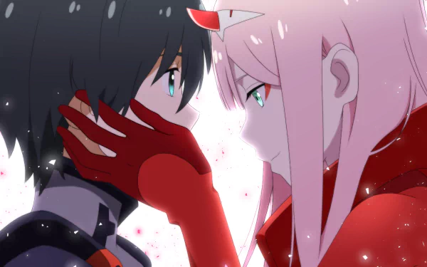 An HD wallpaper featuring Hiro and Zero Two from the anime Darling in the FranXX, depicting a close, intense moment between the two characters with a soft, glowing background.