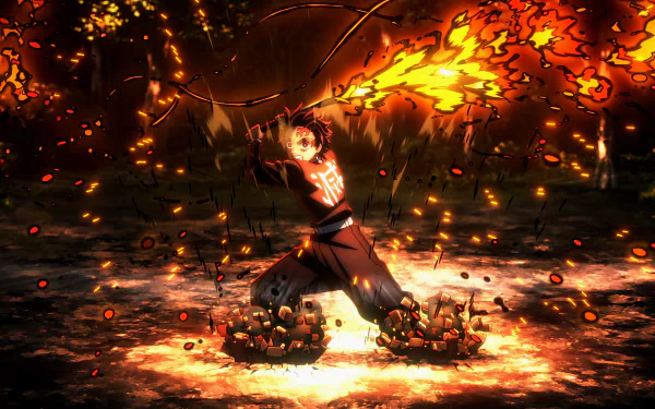 Tanjiro Kamado from Demon Slayer: Kimetsu no Yaiba unleashes a fiery attack in a dynamic 4K Ultra HD anime desktop wallpaper scene.
