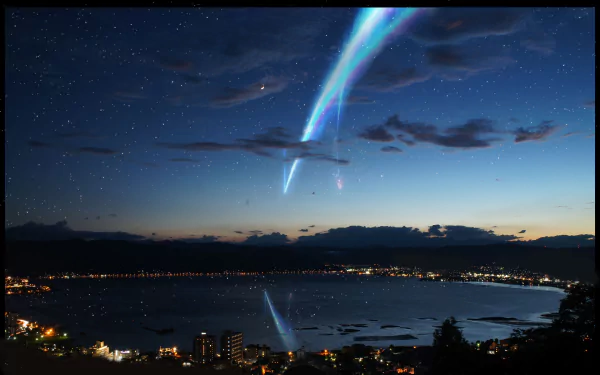 HD desktop wallpaper featuring a city skyline at night with a beautiful comet streaking through a starry sky and reflecting in the water, inspired by the anime Your Name. Clouds add depth to the scene.