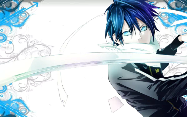 HD desktop wallpaper featuring Yato from the anime Noragami. The image showcases Yato with his blue hair and striking blue eyes, set against a decorative background with blue and white accents.