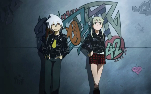 HD desktop wallpaper featuring characters Soul Evans and Maka Albarn from the anime Soul Eater. The two are leaning against a graffiti-covered wall, both dressed in stylish black jackets.