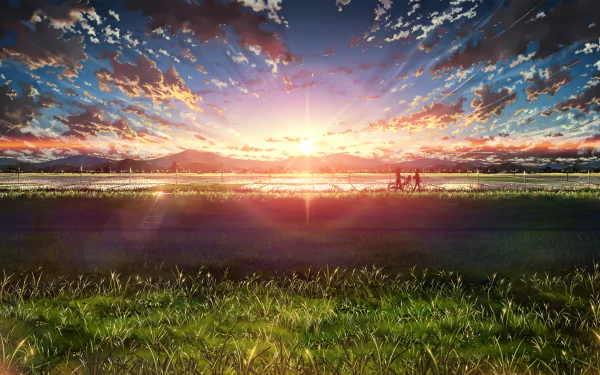 HD anime desktop wallpaper showing a stunning sunrise over a serene landscape with grassy fields and distant mountains, casting warm light across the sky.