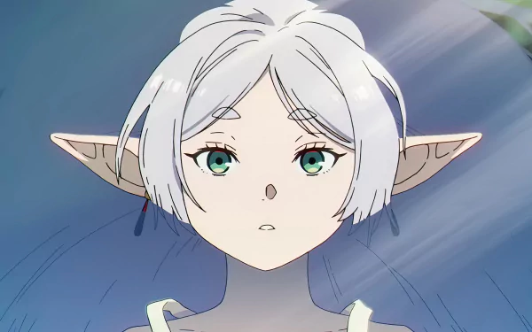 Close-up of Frieren from the anime Frieren: Beyond Journey's End in vibrant 8K Ultra HD, featuring her pale hair and green eyes as a PC desktop wallpaper background.