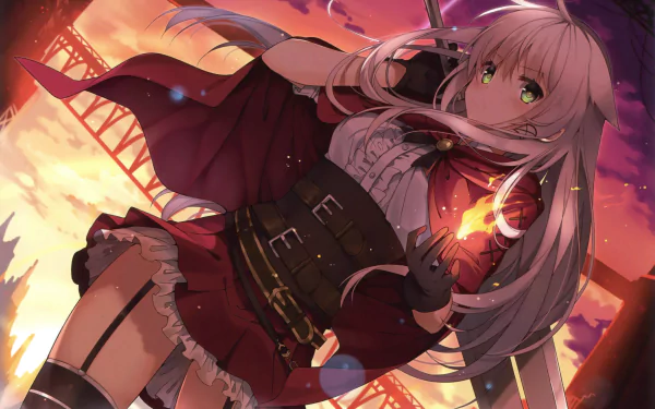 An anime girl with white hair and green eyes holds a small flame. She wears a red outfit with a cape. The background shows a sunset, flames, and a bridge. HD desktop wallpaper.