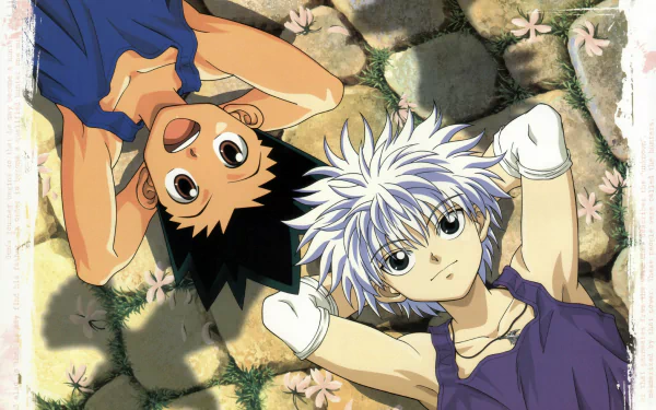 HD wallpaper featuring Killua Zoldyck and Gon Freecss from the anime Hunter x Hunter, lying on the ground, gazing upward.
